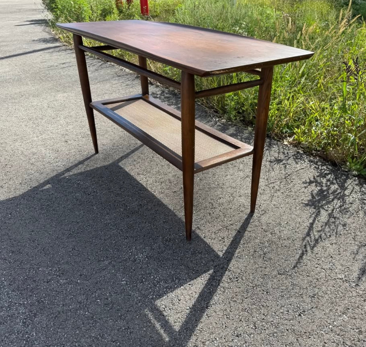 Bassett Console Table with Rattan Shelf