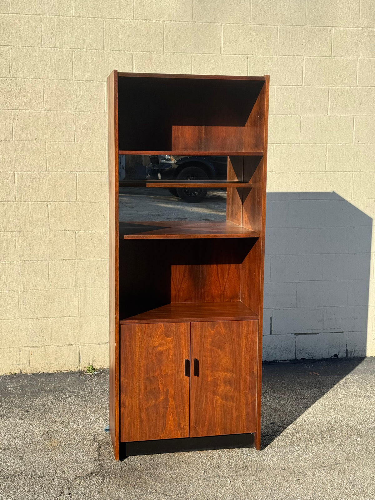 Midcentury Walnut Bookcase — Staggered Shelving & Cabinet Base