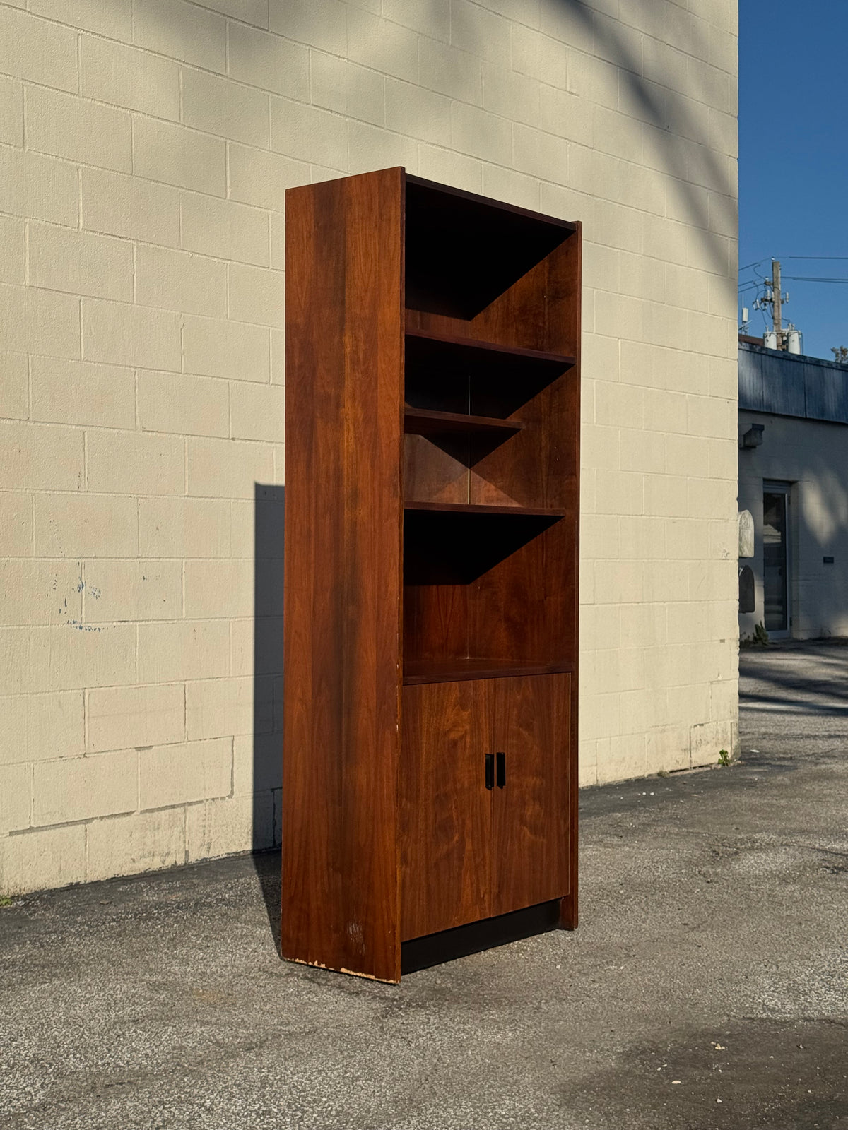 Midcentury Walnut Bookcase — Staggered Shelving & Cabinet Base