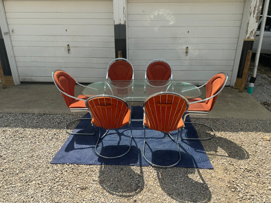 Midcentury Cantilever Dining Set - Chrome Chairs with Retro Orange Cushions and Chrome Table with Solid One-Piece Glass Top