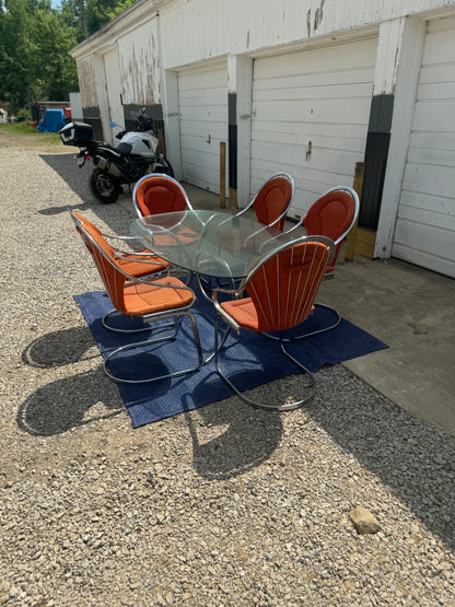 Midcentury Cantilever Dining Set - Chrome Chairs with Retro Orange Cushions and Chrome Table with Solid One-Piece Glass Top