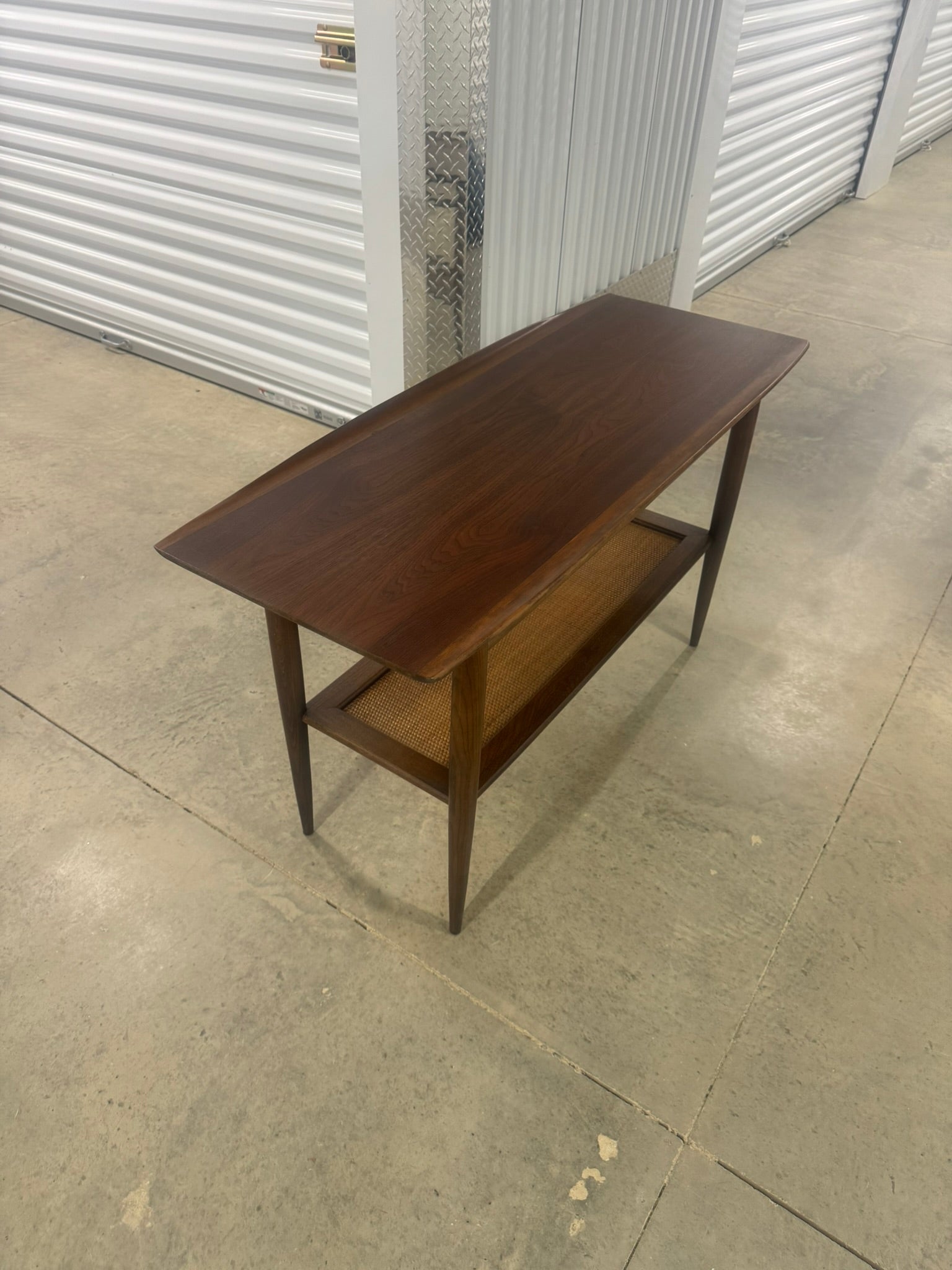 Bassett Entryway Table with Rattan Shelf